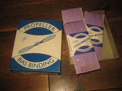 Eske med innhold, PROPELLER, BIAS BINDING, 60 tallet