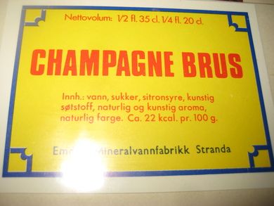 Strøken etikett fra Emdals Mineralvannfabrikk, Stranda:   CHAMPAGNE BRUS. 60- 70 tallet.