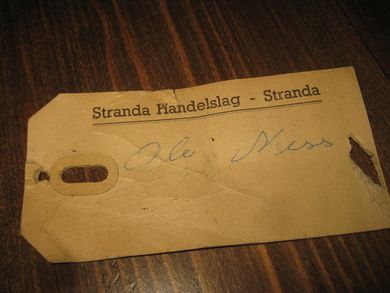 Merkelapp fra Stranda Handelslag, Stranda, 60 tallet. 