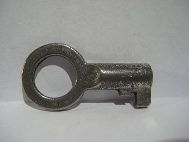 Liten nøkkel,  ca. 3.9 cm lang.