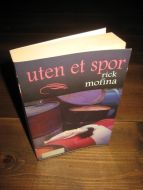 MOFINA: UTEN ET SPOR. 2003.