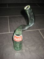 Deformert COLA flaske