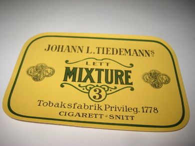 Strøken, ubrukt etikett fra JOHAN L. TIEDEMANNS Tobakksfabrik. LETT MIXTURE 3. 50 tallet.