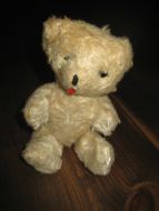 Nostalgisk, gammel teddybjørn, ca 18 cm høg, 50-60 tallet.