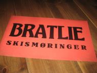 Reklamesak med tekst: BRATLIE SKISMØRNINGER. 50-60 tallet. 