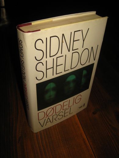 SHELDON, SIDNEY: DØDELIG VARSEL. 2005.