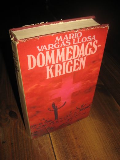 VARGAS LLOSA, MARIO: DOMMEDAGS KRIGEN. 1982. 